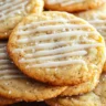 Golden, buttery Earl Grey Sugar Cookies on a plate with tea.