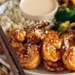 Hibachi Shrimp 2 Skillet-cooked hibachi shrimp glazed in soy butter sauce with garlic and sesame